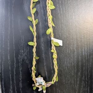 Braided Necklace with Green Leaf Accents and‎ Elephant Charm